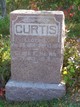  Lloyd E. Curtis