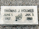 Thomas J. Holmes