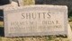  Holmes M. Shutts