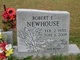  Robert E. Newhouse