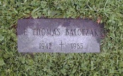 E. Thomas Balcezak 