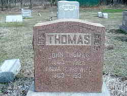 John E Thomas 