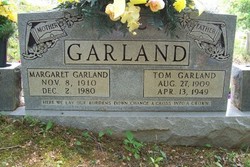 Thomas “Tom” Garland 