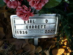 Earl D. “Tommy” Garrett 