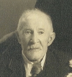 John B. Belz 