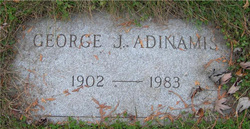 George J. Adinamis 