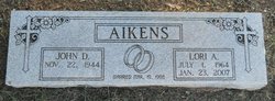 John D. Aikens 