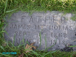 James M. Thomas 