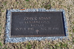 John Clarence “J.C.” Adams 