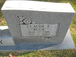 Claude E. “Buck” Acy 