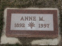 Anne M Benson 