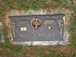Mitzi L Holley 