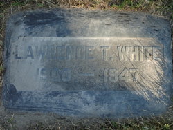 Lawrence T White 