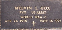 Melvin L Cox 
