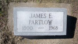 James E. Partlow 
