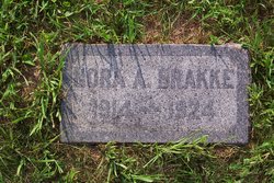 Nora A Brakke 