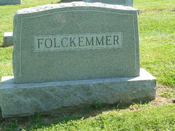 C. <I>Warner</I> Folckemmer 
