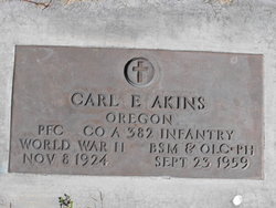 Carl E. Akins 