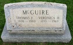 Thomas F McGuire 