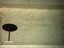 George E Holland 