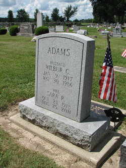 Wilbur C. “Peck” Adams 