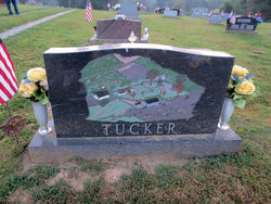 Virgil E. “Bud” Tucker 