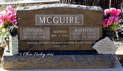 Joseph “Joe” McGuire 