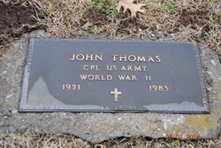 Corp John A Thomas 