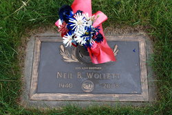 Neil B Wollett 