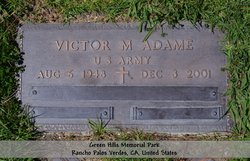Victor M. Adame 