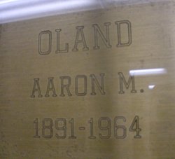 Aaron M Oland 