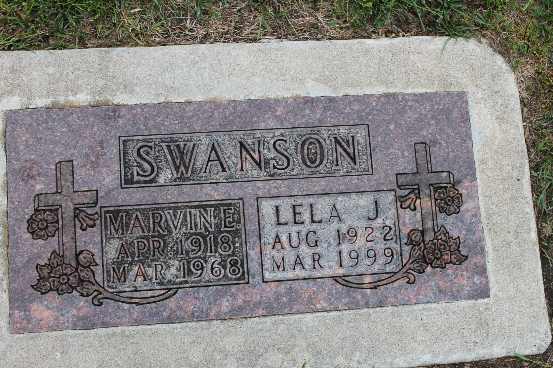 grave marker of family Swanson. Marvin E, 1918-1968 and Lela J, 1922-1999