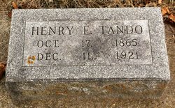 Henry E Tando 
