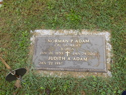 Corp Norman P. Adam 