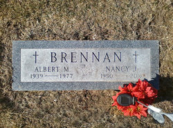Albert M Brennan 