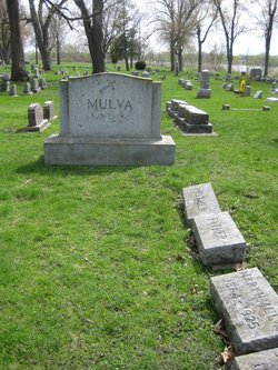 John E Mulva 