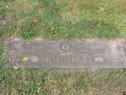 John G. Kuches 