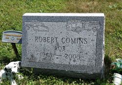Robert E. Comins 