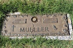 Roger E Mueller 