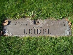 John M. Leidel 