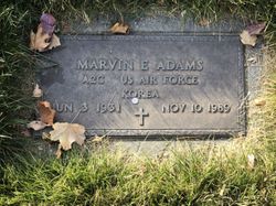 Marvin E Adams 