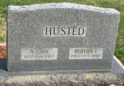 A. Carl Husted 