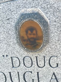 Douglas E Baggett 
