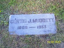 Curtis J Mudgett 