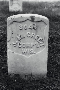 Corp John M. Green
