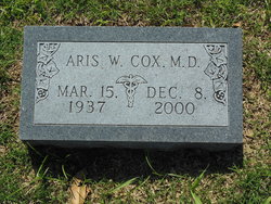 Dr Aris W Cox